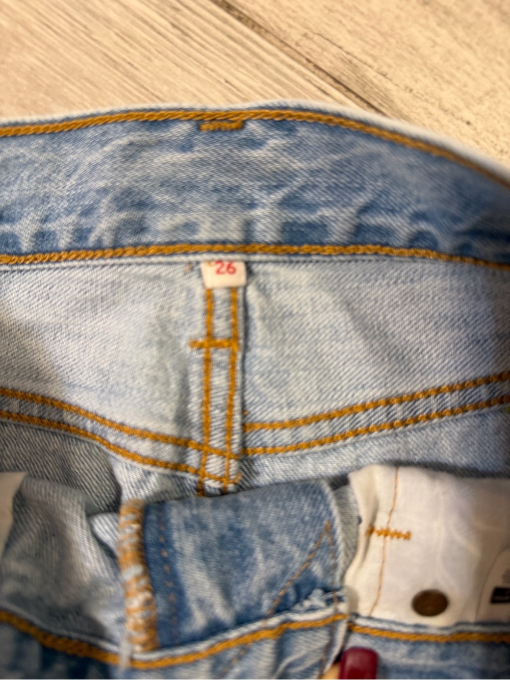 Levi's Light Wash Distressed Denim Mini Skirt with Frayed Hem - Picture 3 of 3